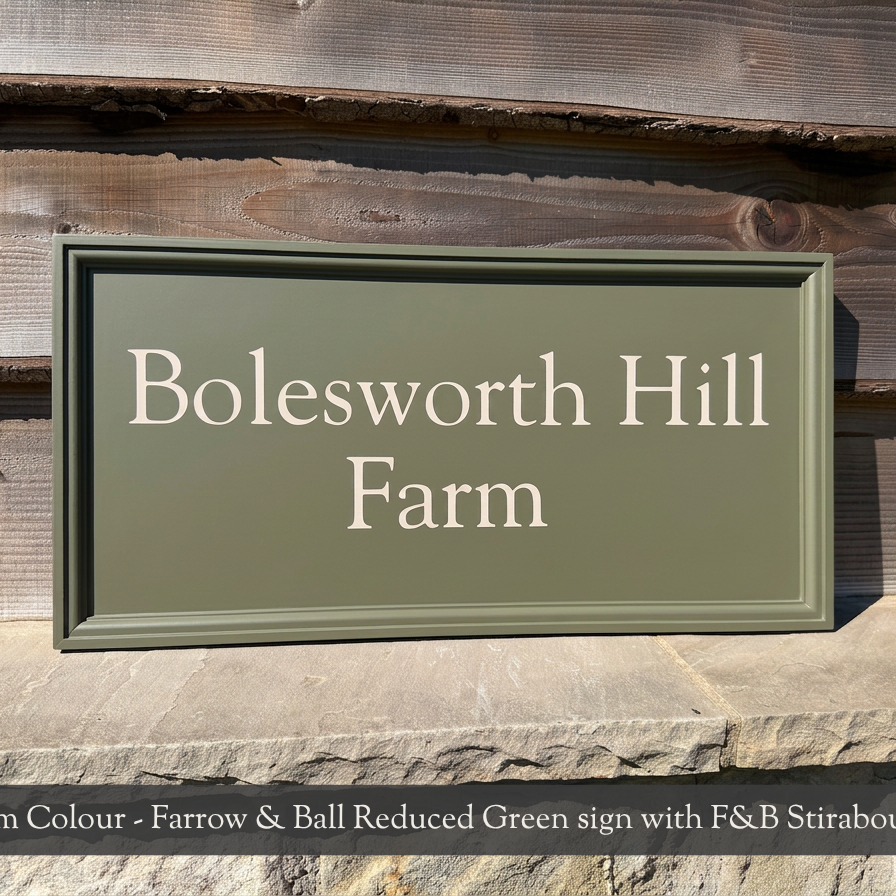 A rectangular custom-finished sign for 'Bolesworth Hill Farm' in reduced green, mounted on a rustic wooden wall. A text banner at the bottom reads 'Custom Colour - Farrow & Ball Reduced Green sign with F&B Stirabout text'.